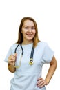 A female doctor with a stethoscope isolated on white background. Smiling doctor woman with stethoscope in hand. Beautiful young Royalty Free Stock Photo
