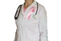 Female doctor with stethoscope and pink ribbon, isolated Health care, medical breast cancer awareness concept Royalty Free Stock Photo