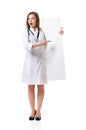 Female doctor with stethoscope showing blank Royalty Free Stock Photo
