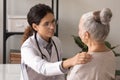 Female doctor support elderly patient at consultation Royalty Free Stock Photo