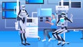 female doctor surgeon in protective mask working with robots in clinic surgery room medicine healthcare