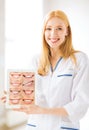 Female doctor with tablet pc and smiles Royalty Free Stock Photo