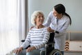 Female doctor take care of disabled senior lady Royalty Free Stock Photo