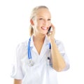 Female doctor talking on the cell phone isolated on white Royalty Free Stock Photo