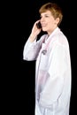 Female doctor talking on a cell phone Royalty Free Stock Photo