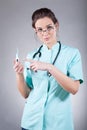 Female doctor with thermometer Royalty Free Stock Photo