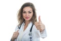 Female doctor with thumbs up isolated over a white background Royalty Free Stock Photo