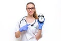 Female doctor in white coat he holds watch in his hand. Time to take care of your health. Isolated on white background Royalty Free Stock Photo