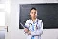 Female doctor woman teaching at medical school