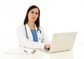 Female doctor working on medical expertise and searching information on laptop at hospital office Royalty Free Stock Photo