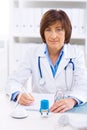 Female doctor working at office Royalty Free Stock Photo