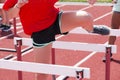 Female doing hurdle drills on the track Royalty Free Stock Photo