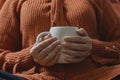 Female drinking coffee in a cold autumnal morning Royalty Free Stock Photo