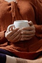 Female drinking coffee in a cold autumnal morning Royalty Free Stock Photo