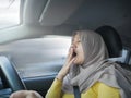 Female Driver Asleep While Driving a Car