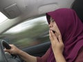 Female Driver Asleep While Driving a Car