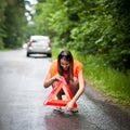 Female driver after her car has broken down Royalty Free Stock Photo