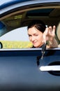 Female driver offering her car keys Royalty Free Stock Photo