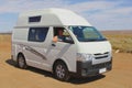 Female driver campervan desert, outback Australia