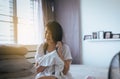 Female drying her long hair with dryer,Young asian woman drying hair with towel Royalty Free Stock Photo