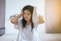 Female drying her long hair with dryer,Young asian woman drying hair with towel Royalty Free Stock Photo