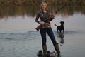 Female Duck Hunter with her Labrador Retriever Royalty Free Stock Photo