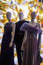 Female dummies in stylish and fashionable clothes in a show-window of shop. New collection.
