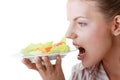 Female eating her salad Royalty Free Stock Photo