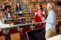 Female elderly professor giving a lecture