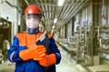 Female electrical engineer with protective gear Royalty Free Stock Photo