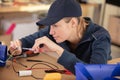 female electrician checking fusebox Royalty Free Stock Photo