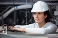 female electrician fixing ceiling wiring Royalty Free Stock Photo