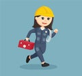 Female electrician running with tools