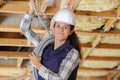 female electrician wiring inside ceiling Royalty Free Stock Photo