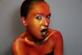 Female emotions. unusual makeup. drawing on the body. unusual makeup. face art. body art. isolated on grey background
