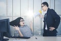 Female employee being shouted by her boss Royalty Free Stock Photo