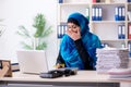 Female employee in hijab working in the office Royalty Free Stock Photo