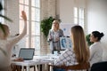 Female employee interact with businesswoman at meeting Royalty Free Stock Photo