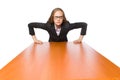 The female employee sitting at long table isolated on white Royalty Free Stock Photo