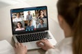 Female employee talk on video call with diverse colleagues Royalty Free Stock Photo