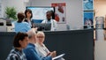 Female employee working at hospital reception counter Royalty Free Stock Photo