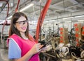 Female employer inspecting