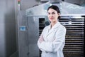 Female engineer in front of Food Dryer Dehydrator Machine Royalty Free Stock Photo