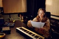 Female engineer in headphones, recording studio Royalty Free Stock Photo