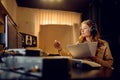 Female engineer in headphones, recording studio Royalty Free Stock Photo