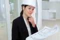 female engineer planning home design Royalty Free Stock Photo