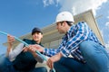 female engineer shows pipes to construction manager