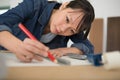 female engineer using pencil drawing Royalty Free Stock Photo