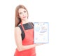 Female entepreneur holding clipboard with charts Royalty Free Stock Photo