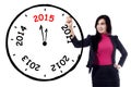 Female entrepreneur makes annual clock Royalty Free Stock Photo